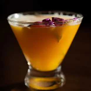 a glass filled with a drink