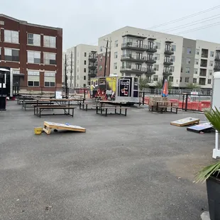tables and benches in a parking lot