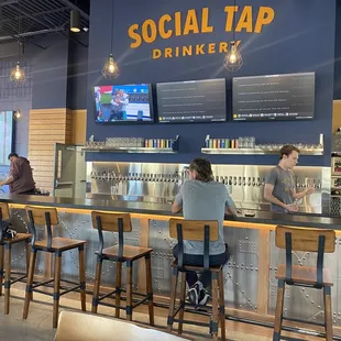 people sitting at the bar