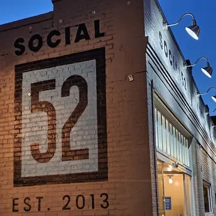 the number 52 on the side of a building