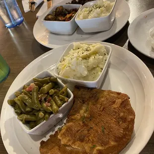Pork Chop, garlic mashed potatoes, and green beans.