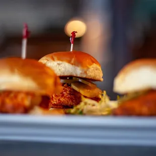 a plate of sliders