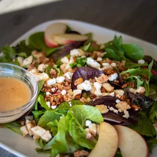 a salad with apples and walnuts