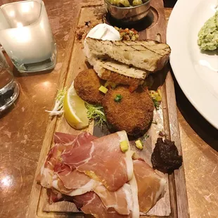 Olives, burrata, crab cakes and prosciutto