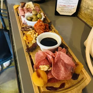 a platter of meats and cheeses