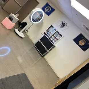 Our booth pictured with a gold backdrop