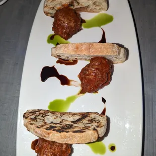 House made meatballs - Beef, Pork and Veal Blend - Pomodoro, Parmesan, Ciabatta, Balsamic Reduction