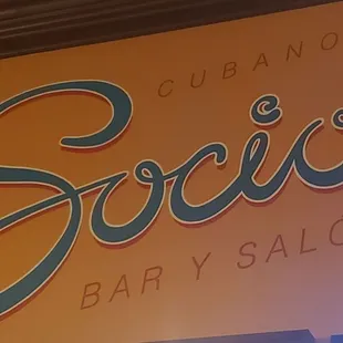 a close up of a sign for a salon