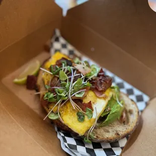 Avocad-omg with egg and bacon
