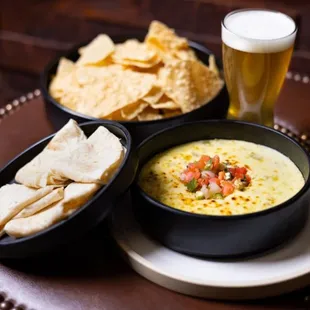 Chips with queso and beer