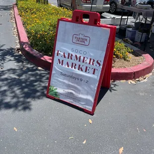 a sign for farmers market