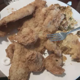 Fish was tender as hell. Two kinds of fish in platter. That&apos;s my mint. Lol. Sorry about that. Squash casserole and corn fritters was good.