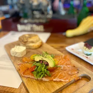 Cured salmon platter with everything bagel biscuit