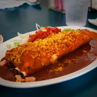 From a few years ago, breakfast burrito (ham) smothered with red chile sauce