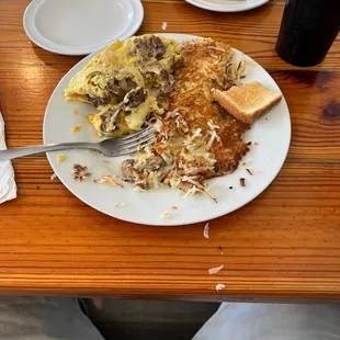 Philly cheese omelet and hash browns