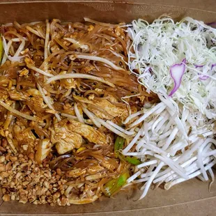 Delivery chicken pad thai. They separate all the elements, a thoughtful touch for the picky eaters who want to bogart all the noodles.