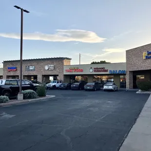 The exterior of Soda Bun and the neighboring businesses.