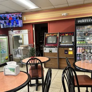 There are tables for you to enjoy your food. Live bait fridge in the corner!