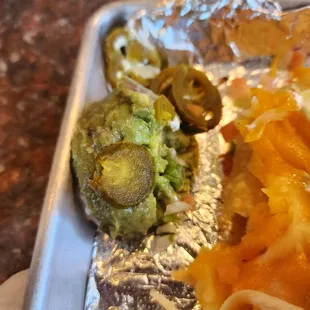 The guacamole that was held up by the jalapeños.