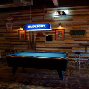 a pool table in a bar