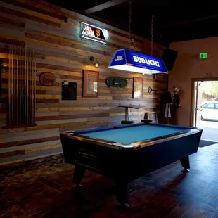 a pool table in a restaurant