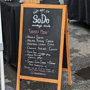 a chalk board with a menu on it