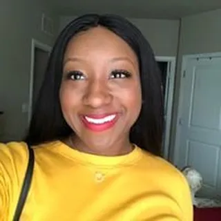Dynisha C.