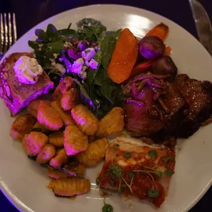 Buffet - spinach salad, roasted veggies, beef loin, fish, gnocchi, bread