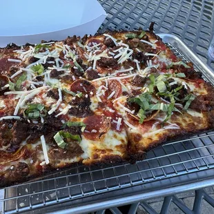 ENFORCER - DETROIT RED SAUCE - BRICK CHEESE BLEND - SMOKED BACON - PINCHED SAUSAGE - EZZO CUP PEPPERONI - FRESH BASIL - PECORINO ROMANO