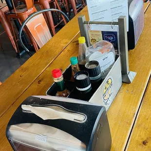 Table set up. Loved the choices of hot sauces!