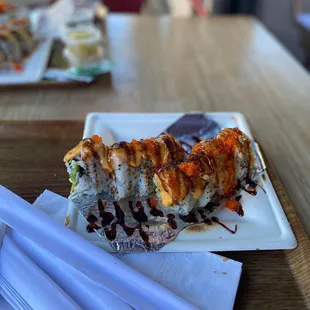 a plate of sushi on a table