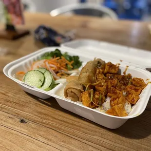 a take out container of food