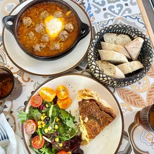 a plate of food and a bowl of soup