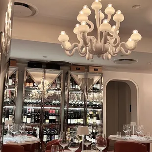 a dining room with a chandelier