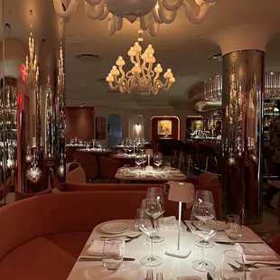 a dining room with a large chandelier