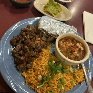 Steak picado with rice &amp; beans and a small side of guacamole.