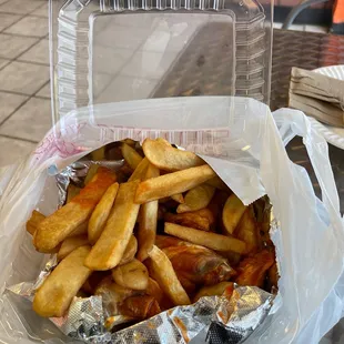 french fries in a plastic container