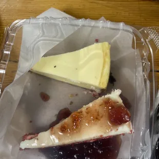Red Velvet cake with strawberries and plain cheesecake.