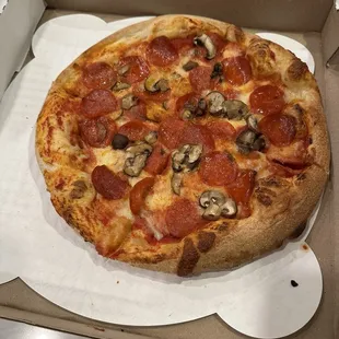 Pepperoni and mushroom small pizza