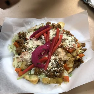 Tajadas con carne molida, me encanta el repollo, la papa, la salsa, absolutamente deliciosa. Nov 2022