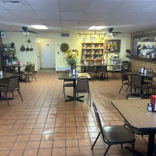dining area with tables and chairs