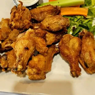 Perfect chicken wings with teriyaki on the side