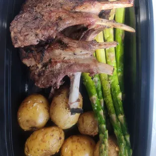 Lamb chops, small yukon roasted potatoes, asparagus