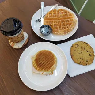 Waffle, fresh baked cookie, breakfast sandwich