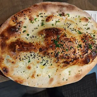 Lamb Shank with fresh baked bread dough on top
