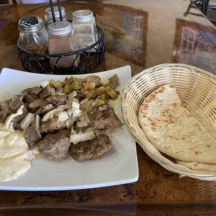 Lamb, beef, gyro, hummus, pita