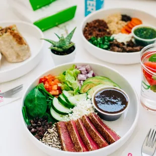 a plate of food and a drink on a table