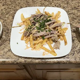 Pork Shoulder fries and Mac n&apos; cheese