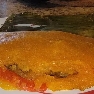 Yuca Pastelès wrapped in a banana leaf