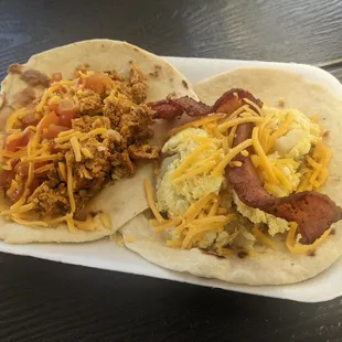 Chorizo beans cheese and tomatoes. Loaded breakfast taco with bacon, egg, cheese and beans.